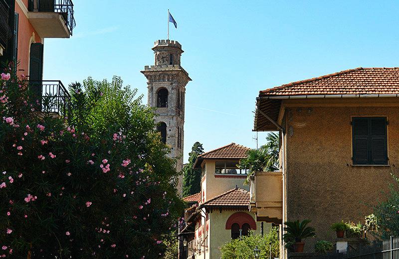 A view of the houses, a church and flowers in Rapallo